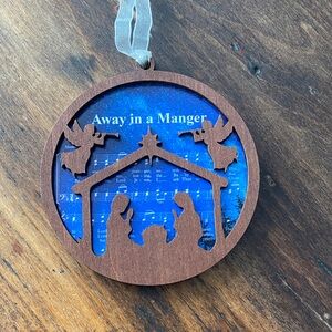 Set of five music sheet nativity ornaments never used